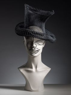 "You are looking at our limited edition selection of headpieces that are the result of Tatiana's creative bursts. Each headpiece is created using the finest handmade techniques and highest quality supplies. This is a interpretation of a top hat with a wire skeleton and crinoline. The wire work at the fron adds 20's Charlie Chaplin style to it.  It is a very unusual statement piece that will look amazing if you are going for a vintage inspired look!  It can be made in 3 colours: black, white and Men Headpiece, Black Headpiece, Wire Skeleton, Art Deco Hats, Unusual Hats, Black Tie Optional, Vintage Headpiece, Gold Headpiece, Horse Race