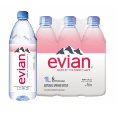 four bottles of evian water are shown next to each other on a white background