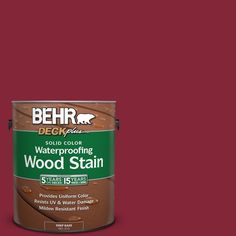 a blue paint can with the words behr waterproofing wood stain on it