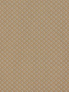 a brown background with blue and white circles