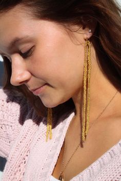 Add a touch of sparkle to your everyday attire with our Gold Bead Double Strand Earrings. Featuring a gold beads that have been hand-strung and are hanging from nickel free hardware, these earrings are lightweight and can easily go from day to night. Statement earrings perfect for New Year's Eve, going out, date night, and Holiday outfits! Each earring is 6" in length and handcrafted by Summer Nikole Jewelry exclusively for Freshwater. Yellow Gold Long Drop Earrings With Dangling Beads, Gold Dangling Bead Earrings, Gold Dangling Bead Jewelry, Gold Beaded Drop Earrings, Gold Dangle Jewelry With Dangling Beads, Gold Dangle Jewelry With Beads, Gold Dangling Beads Earrings For Party, Gold Beaded Hoop Earrings For Party, Dangle Jewelry With Gold Beads For Party