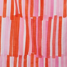 an orange and pink striped fabric with vertical stripes