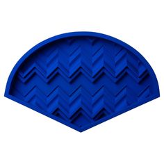 a blue tray with an abstract design on the top and bottom, sitting in front of a white background