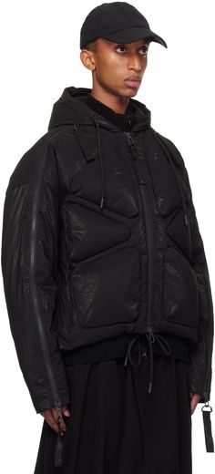 RDS-certified down-filled and quilted nylon-blend taffeta jacket. D-ring pull-tabs at zip hardware. · Drawstring at hood and hem · Two-way zip closure · Zip seam pockets · Two-way zip vent at sleeves · Welt pocket at interior · Full recycled polyester sateen lining Supplier color: Black cloud Fill: 90% white duck down, 10% feather. Quilted Nylon Hooded Jacket For Streetwear, Urban Nylon Puffer Jacket With Detachable Hood, Sporty Nylon Hooded Jacket With Padded Collar, Nylon Puffer Hooded Jacket For Streetwear, Functional Nylon Puffer Jacket With Drawstring Hood, Black Nylon Puffer Jacket With Drawstring Hood, Quilted Nylon Puffer Jacket For Streetwear, Streetwear Quilted Nylon Puffer Jacket, Urban Nylon Puffer Jacket With Zipper Closure