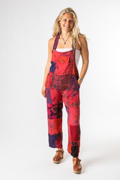 These perfect upcycled overalls are here to bring smiles to you and everyone around you. They will also bring colorful smiles to your closet, we promise. Whether you style them with sandals or rock them with cowboy boots these overalls can do it all. We call them the "hippy" overalls not just because they are a nod to hippie fashion and tie dye overalls of the past, but because of the two sets of coconut buttons on the waist that allow you to adjust the width to maximize your hippy-ness. Did we Trendy Cotton Beach Overalls, Trendy Cotton Overalls For The Beach, Casual Multicolor Overalls For Spring, Pink Relaxed Fit Overalls For Summer, Multicolor Cotton Overalls For Summer, Multicolor Spring Overalls With Pockets, Casual Patchwork Jumpsuits And Rompers For Spring, Bohemian Overalls With Pockets For Spring, Bohemian Cotton Overalls For Spring