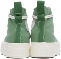 Converse.Green Chuck Taylor All Star Lift Platform Utility Sneakers.High-top bedford cord sneakers in green..· Rubber cap toe.· Wraparound lace-up closure.· Pull-tab at tongue.· Ripstop logo patch at inner side.· Eyelets at inner side.· Pull-loop at heel.· Cushioned Ortholite® insole.· Mesh lining.· Textured platform midsole.· Treaded rubber sole.· Platform: H1.75'.Supplier color: Herby/Egret/Admiral elm.Upper: textile. Sole: rubber..Made in Viet Nam..241799F127056 Green High-top Sneakers With Vulcanized Sole For Spring, Green Converse Sneakers For Outdoor, Green Canvas High-top Sneakers With Round Toe, Green Rubber Toe Cap High-top Lace-up Sneakers, Converse Green High-top Sneakers, Green Converse High-top Sneakers, Green Lace-up High-top Sneakers With Rubber Toe Cap, Green Converse Sneakers With Rubber Toe Cap, Green High-top Sneakers With Rubber Toe Cap