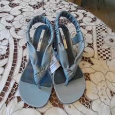 These Zara's Light Blue Sandals Have Been Made From Soft Strips Of Faux Leather That Elegantly Knott At The Front. They're Set On A Slightly Flared 2.5" Kitten Heel. The Slingback Strap Is Elasticated, So You'll Be Able To Slip Them On With Ease. Size Eu 41b- Us 10m. New With Tags Attached. Come From A Smoke Free Home. Blue Open Toe Slingback Sandals For Spring, Blue Open Toe Synthetic Slingback Sandals, Blue Open Toe Slingback Sandals, Blue Synthetic Slingback Sandals, Blue Slingback Sandals For Spring Party, Blue Summer Party Slingback Sandals, Zara High Heel Slingback Sandals For Summer, High Heel Blue Slingback Sandals For Spring, Blue High Heel Slingback Sandals For Spring