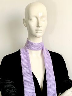 Elevate your style with our Handmade Sparkling Lilac Skinny Scarf - a breathtaking accessory that effortlessly blends grace and glamour. This lavender-hued, long scarf tie is meticulously crafted to add a touch of sophistication to your ensemble. The sparkling lilac color exudes charm and versatility, making it a perfect accent for any occasion. Crafted with precision and care, this purple thin scarf is not just an accessory; it's a statement piece. Whether draped loosely for a casual look or in Long Scarf Tying, Knitted Scarves, Scarf Tie, Scarf Handmade, Scarf Tying, Scarf Women, Lilac Color, Scarf Design, Knit Stitch