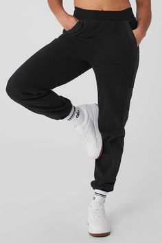 Made from a fleecy-soft fabric with smooth, contrasting panels down the legs, these pants are every bit as cozy as they look. They have a total of 4 pockets—2 on the sides, 2 on the legs—plus a stretchy high-rise waistband and stretchy cuffed hems for a jogger-style fit. Our advice? Get the matching jacket, too. Comfortable Cotton Bottoms By Alo Yoga, Comfortable Cotton Alo Yoga Bottoms, Comfortable Alo Yoga Cotton Bottoms, Sporty Cotton Bottoms By Alo Yoga, Alo Yoga Sporty Cotton Pants, Sporty Relaxed Fit Sweatpants For Casual Wear, Alo Yoga Relaxed Fit Sweatpants With Pockets, Alo Yoga Sporty Cotton Sweatpants, Alo Yoga Sporty Relaxed Fit Joggers