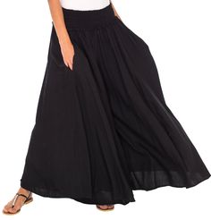 Get your comfort on with these wide leg palazzo pants. Flowy and free help bring out your bohemian side. Perfect for summer days because the material is lightweight and breathable. No heavy fabric here! Elastic waist and side pockets enhance the flowy pants. Easily dress up these pants with heels and a fun top or lounge around the house. Whatever you choose these pants will provide you comfort all day long. Wide and flowy pant legs Side pockets and elastic waistband Soft and lightweight material Baggy Wide Leg Pants With Elastic Waistband For Beach, Black Bohemian Long Skirt, Black Full Length Bohemian Harem Pants, Black Full-length Bohemian Harem Pants, Flowy Black Bohemian Maxi Skirt, Bohemian Black Flowy Maxi Skirt, Bohemian Solid Color Harem Pants For Vacation, Flowy Maxi Bottoms With Elastic Waistband, Hippie Style Black Wide Leg Pants