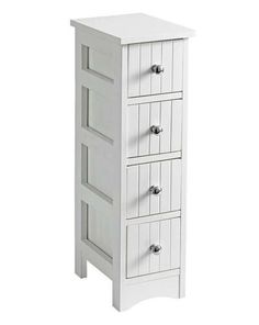 a white wooden cabinet with three drawers