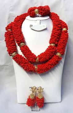 2 Layers New Latest Design African Red Beads Bridal Wedding Jewelry Necklace Set Beads can be customised to your specification and color Comes with Necklace, earring and bracelet Necklace: 2 layers Bracelet: 1 Layers Red Coral Jewelry For Wedding, Red Coral Wedding Jewelry In Red, Red Coral Wedding Jewelry, Traditional Red Coral Beaded Necklaces For Wedding, Gold Red Coral Jewelry For Wedding, Elegant Red Coral Beads For Weddings, Elegant Red Jewelry With Spacer Beads, Wedding Jewelry In Red Coral With Polished Beads, Wedding Red Coral Beaded Necklace With Polished Beads