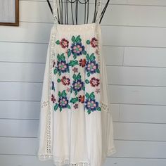 This Beautiful Little Dress Is Fully Lined With Cotton Lining. Dress Is Cotton With The Cutest Details And Embroidery. Chest Approx 17” Across For Small, 18” Across For Medium And 19” Across For Large. Length Is Approx 37-38”. Elastic Back. New With Tags! Summer Sundress With Floral Embroidery For Beach, Summer Embroidered Mini Dress, Spring Beach Sundress With Floral Embroidery, Embroidered Summer Mini Dress For Beach, Casual Floral Embroidered Sundress For Beach, Spring Embroidered Beach Mini Dress, Casual Floral Embroidery Sundress For Beach, Spring Beach Embroidered Mini Dress, Spring Vacation Embroidered Sundress