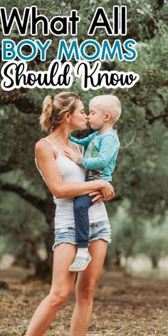 a woman holding a baby in her arms with the words what all boy moms should know