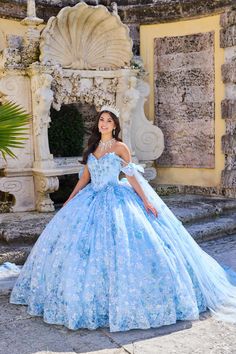 The fabric in this Princesa by Ariana Vara Quinceanera dress is Cracked Ice, 3D Flowers, Sequins, Heat Set Stones, Tulle, Pongee Lining. Detachable Shoulder Straps with Sash, Detachable Train, Back Modesty Panel Included Ice Blue Quinceanera Dresses, Winter Quinceanera, Xv Dresses, Quinceañera Dresses, Allure Couture, Quinceanera Dresses Blue, Detachable Train, Modesty Panel, Princess Sleeves