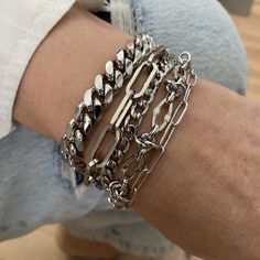 Beautiful everyday stylish and elegant multi strands bracelet that look awesome as well with chic or casual outfits.  ADD approximately 1 - 1.25 inch to your wrist size TO SELECT A SIZE. MATERIALS * 304L stainless steel (hypoallergenic, waterproof and won't change color). CHAINS SIZE * 10mm and 6mm wide curb chain. * 8mm and 4mm wide paperclip chain. * 7mm wide oval particular link chain. On pictures, 6.5 inches wrist showing the 7.75 to 8.5 adjustable bracelet, attached at 7.75 inches. You will Chunky Chain Bracelet, Chunky Layers, Chunky Charm Bracelet, Steel Gifts, Multi Strand Bracelet, Silver Chain Bracelet, Trombone, Strand Bracelet, Bracelet For Women