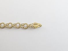 "Wonderful 14k Yellow Gold Charm Bracelet!! Metal purity: 14k gold, Not plated or filled Available length: 7 \" , 8\" long Length and avg weight: 7\"= 4.40 g , 7 1/2\"= 4.90 g , 8\"= 5.20 g Width: Almost 1/4\" or 5 mm wide Closure: Lobster clasp Complementary Gift Box Images may be enlarged to show detail and the item may look larger than it appears in person.In order to reduce buyer remorse and return please pay attention to the photos and read description to make sure about measurements such a Yellow Gold Charm Bracelet With Lobster Clasp, Round Gold Bracelet With Lobster Clasp For Anniversary, Gold Bracelet With Lobster Clasp For Anniversary, Yellow Gold Link Bracelet With Extender, Yellow Gold Chain Bracelet With Extender, Anniversary Gold Bracelet With Lobster Clasp, Formal Yellow Gold Bracelet With Extender, Gift Box Images, Engraved Locket