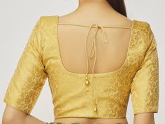 Golden Brocade Blouse In Round Neck And Elbow Sleeves Blouse, Indian Blouse, Wedding Blouse, All Size Blouse...  Fabric-- Brocade Golden Blouse Elbow Sleeves blouse Round neck blouse Front hook blouse Princess cut blouse if you could include the following info in the note to whenever you placed the order, you will get best matched blouse - bust - waist size - blouse length - sleeve length - sleeve loose - Wash care -Dry clean only thank you for visiting in my shop.. Elegant Long Sleeve Padded Choli, Fitted Blouse With Pallu For Wedding, Fitted Wedding Blouse With Pallu Detail, Fitted Wedding Blouse With Pallu, Traditional Gold Sleeveless Blouse, Gold Unstitched Blouse Piece For Wedding, Elegant Wedding Blouse With Back Yoke, Elegant Formal Padded Blouse Piece, Fitted Padded Blouse Top For Wedding