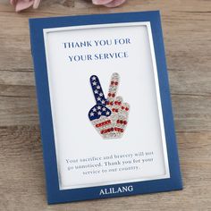 Express your deepest gratitude to members of the military, veterans, and their families with this stunning gift set. The centerpiece is a dazzling red, white, and blue crystal peace sign brooch pin, a beautiful symbol of patriotism and peace. The pin is crafted from safe, hypoallergenic, and oxidation-resistant metal alloy for long-lasting wear. Paired with the brooch is a heartfelt message card expressing your appreciation: "Your sacrifice and bravery will not go unnoticed. Thank you for your s Blue Brooch, Beautiful Symbols, Blue Envelopes, Red Rose Flower, Happy Memorial Day, 21st Gifts, Patriotic Gifts, Military Veterans, Blue Gift