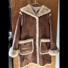 Scandinavian Faux Fur Faux Leather Coat Full Length Jacket Outerwear Women's Small Never Worn. Features A Buttery Soft Faux Leather Outer Shell In A Light Tan Color Faux Fur Trim Full Interior Lining Of Soft Faux Fur, Including The Arms. It Also Has Dual Side Pockets And A Button Front Closure Length: 35” Pit To Pit 22” Thank You For Looking Fitted Winter Outerwear With Faux Front Pockets, Long Coat With Faux Fur Lining For Cold Weather, Brown Faux Fur Lined Outerwear, Brown Long Coat With Faux Fur Lining, Brown Winter Outerwear With Faux Front Pockets, Brown Outerwear With Faux Front Pockets, Brown Long Sleeve Outerwear With Faux Front Pockets, Brown Hooded Faux Fur Outerwear, Brown Faux Fur Long Coat