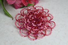 Small beaded floral style brooch with pin.  Very elegant and unique design to create perfect look for you. This can be a great gift! Handmade Pink Flower Brooches, Pink Beaded Party Brooches, Pink Beaded Brooches For Party, Pink Party Brooch With Flower Decoration, Pink Flower Decoration Brooches For Party, Pink Party Brooches With Flower Decoration, Elegant Handmade Pink Brooches, Handmade Pink Brooches For Party, Handmade Pink Party Brooches