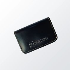 the-dua-brand-wallets-front Black Minimalist Card Holder, Rectangular Business Wallet With Interior Key Chain Holder, Classic Black Wallet For Everyday Use, Black Card Holder For Everyday Use, Classic Black Wallets For Everyday, Black Card Holder With Cell Phone Pocket For Gift, Black Card Holder With Cell Phone Pocket As Gift, Black Bifold Card Holder For Everyday Use, Classic Coin Purse With Rfid Blocking