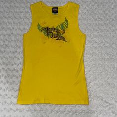 Harley Davidson Embroidered Yellow Tank Top. Size Large New Without Tags. Shop With Confidence! 5 Rated Posh Ambassador, Fast Shipping From A Clean Smoke Free Home! 100% Cotton Embroidered Michael’s Harley Davidson Cotati, California Limited Edition I63 Casual Yellow Tops With Embroidered Graphics, Yellow Cotton Top With Embroidered Graphics, Casual Yellow Embroidered Tops, Fitted Embroidered Yellow Tops, Fitted Yellow Embroidered Tops, Yellow Tank, Yellow Tank Top, Yellow Black, Black N Yellow