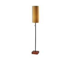 the floor lamp is made from wood and has a brown shade on it's side