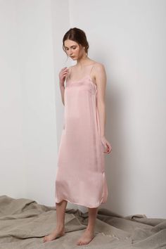 Simple meets elegant - it’s no wonder we named it the Easy Slip Dress. Designed with a relaxed fit, this silhouette has a scoop neck detail with hidden side pockets at hips. We love to wear ours layered underneath jackets and sweaters or wear just for lounging. French seam details mean that all raw edges are hidden in an elegant finished seam. Elegant Summer Dresses For Relaxation, Feminine Slip Dress For Loungewear, Casual Fitted Slip Dress For Sleep, Solid Color Slip Dress With Adjustable Straps For Spring, Solid Slip Dress With Adjustable Straps For Spring, Spring Lounging Dresses With Spaghetti Straps, Summer Lounging Camisole Dress, Solid Color Camisole Slip Dress For Daywear, Spring Daywear Camisole Slip Dress