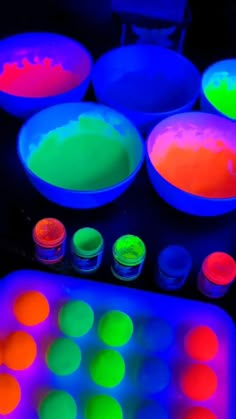 neon colors are being used to make glow in the dark cake pans and cupcake tins