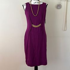 Purple Dress With Tag. Elegant Purple A-line Midi Dress, Chic Purple Formal Dress, Elegant Purple Sleeveless Evening Dress, Elegant Purple Sleeveless Midi Dress, Elegant Sleeveless Midi-length Lined Dress, Purple Lined Midi Length Dresses, Chic Purple Midi Dress For Formal Events, Elegant A-line Purple Midi Dress, Chic Purple Sleeveless Dress