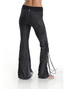 "Soft Mineral Wash Fringe Fold over Yoga Pants! This Fringe Fold over Yoga Pants can be used in all the seasons. A timeless silhouette with western-inspired fringe trim detailed bell bottoms, this is perfect for a night out on the town. Great with cowboy boots! PRODUCT DETAILS: *cotton/polyester*  WASH CARE:  Wash cold Color separate *Do Not Bleach* *  Made in United States *  Care Instructions: Machine wash \"Buyer is responsible for return shipping costs and any loss in value if an item isn't returned in original condition.\"" Stretch Pants With Frayed Hem For Fall, Bohemian Bottoms With Frayed Hem For Festivals, Wide Leg Bottoms With Tassels, Spring Wide Leg Bottoms With Fringe, Bohemian Festival Bottoms With Frayed Hem, Casual Bottoms With Tassels For Fall, Bohemian Fringe Bottoms For Fall, Wide Leg Fringe Pants For Fall, Spring Casual Pants With Tassels