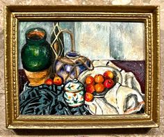 an oil painting of fruit and vases on a table cloth in a gold frame