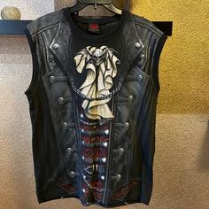 Mens Size Large New Without Tags! Pet And Smoke Free Home No Steam Punk Biker Should Be Without This. Realistic Leather, Laces & Buckles With A Metallic Winged Skull And Cravat. This Is Heavy Metal With A Twist Of Victorian Elegance, And Every Bit The Gothic Spiral Masterpiece. Allover Sleeveless T-Shirt Black Is Made Of Top Quality 100% Cotton, Interlock Using Skin Friendly, Azo-Free, Reactive Dyes. Victorian Elegance, Winged Skull, The Gothic, Sleeveless T Shirt, Sleeveless Tshirt, Steam Punk, Black Tshirt, Heavy Metal, Tank Top Shirt