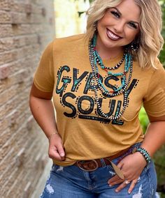 This Gypsy Soul Tee is the perfect way to show off your wanderlust with a style that's as free-spirited as you are! Its vibrant print adds a touch of bohemian charm to any outfit, and its comfy fit will have you feeling carefree all day long. Let your inner gypsy shine! Turquoise Accents, Clothing Websites, Girls Wardrobe, Mom Tees, Boho Chic Fashion, Comfy Fits, Western Fashion