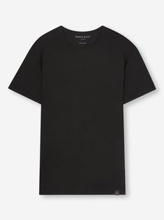 Our signature Basel men’s t-shirt in black is a wardrobe essential: versatile and classic. Made from a unique blend of stretch micro modal for an extraordinarily soft and comfortable wear, it will quickly become your go-to black t-shirt. Perfect for sleeping, lounging or making a long-haul flight a lot more bearable. Featuring a soft crew-neck band finish and a streamlined shape that is both comfortable and flattering, we've elevated this loungewear t-shirt into a luxury essential. One of our si Duvet Day, Long Haul Flight, Long Haul, Lounge Shorts, Loungewear Shorts, Basel, Modern Man, Black Pattern, Soft Black