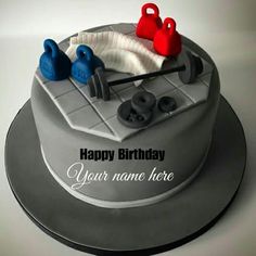 a birthday cake that is shaped like a gym equipment