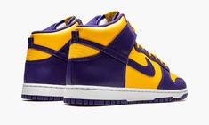 The Nike Dunk High “Lakers” is a colorway of the vintage basketball shoe that features the team uniform colors of the Los Angeles Lakers.  The two-tone, yellow-and-purple “Lakers” Dunk High was released ahead of the ‘22-23 NBA season in September 2022.  Sans official Lakers branding, the design nonetheless salutes the storied basketball team with its University Gold leather base with contrasting Court Purple leather overlays and Swoosh branding.  The “Nike” and Swoosh logos on the yellow nylon t Lakers Shoes, Sneakers Box, Branded Shoes For Men, Kobe Shoes, Vintage Basketball, Dunks Nike, Basic Hoodie, Nba Season, Nike Dunk High