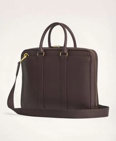 The perfect size to bring to the office and on the plane, our briefcase boasts a classic smooth, full grain texture along with its gunmetal hardware, double-sided zipper, detachable shoulder strap, navy cotton twill lining and every pocket you need to get from point A to point Z..15 ¾ X 12 X 2' Gusset 5½' handle drop..100% leather.Imported.The perfect size to bring to the office and on the plane, our briefcase boasts a classic smooth, full grain texture along with its gunmetal hardware, double-s Men's Leather Briefcase, Leather Briefcase Men, On The Plane, Gunmetal Hardware, Grain Texture, Leather Briefcase, Travel Collection, Personal Shopping, Brooks Brothers