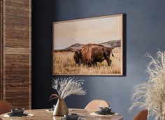 an animal is standing in the middle of a room with blue walls and brown chairs