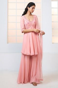 Peach peplum kurta with resham, beads and sequin floral pattern embroidery. Comes with sharara and scatter embroidered dupatta. - Aza Fashions Sheer Dupatta Georgette Peplum Set, Georgette Peplum Set With Sheer Dupatta, Anarkali Dress With Sheer Dupatta And Peplum Shape, Festive Peplum Dress With Sheer Dupatta, Bollywood Style Peplum Dress For Reception, Bollywood Peplum Dress For Reception, Elegant Peplum Sharara In Georgette, Elegant Georgette Sharara With Peplum, Diwali Peplum Dress With Mirror Work