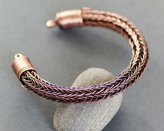 Strong and sturdy viking weave bracelet, all handmade with copper wire, then antiqued and hand polished.  Inside the Viking knit is a heavy copper wire so the bangle will not lose its shape, however you can gently mold it to your personal fit and comfort on your own wrist. Any questions please feel free to ask.  Thank you for looking! Viking Knit Jewelry Tutorial, Viking Weave, Weave Bracelet, Statement Cuff Bracelet, Viking Knit, Bijoux Fil Aluminium, Viking Bracelet, Viking Jewelry, Woven Bracelets