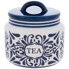 a blue and white canister with the word tea on it