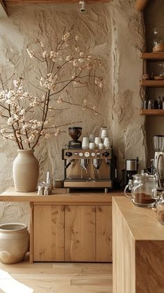 a coffee machine sitting on top of a wooden counter