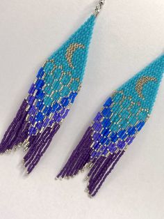 blue and purple seed beaded earrings with crescent moon