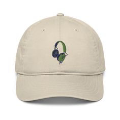 "Retro Headphones Baseball cap, dad hat, Music Embroidery, Music baseball cap, organic cotton concert hat, festival cap Music Lover cap Plum & Pepper Retro Headphones Design.     \"Retro Headphones Embroidery in blue and green\"  This classic hat is made of 100% organic cotton, super comfortable and features a funky Plum & Pepper Embroidery Design. * 100% organic cotton * Fabric weight: 271 g/m² * 3/1 twill * Unstructured with curved visor * 6 panel * Matching sewn eyelets * Self-fabric adjustab Hip Hop Cotton Hat With Curved Brim, Hip Hop Cotton Fitted Hat With Curved Brim, Hip Hop Cotton Dad Hat With Curved Brim, Hip Hop Cotton Cap, Hip Hop Style Cotton Dad Hat With Curved Brim, Hip Hop Cotton Dad Cap, Cotton Hip Hop Dad Hat, Cotton Hip Hop Dad Cap, Hip Hop Cotton Hat With Curved Bill