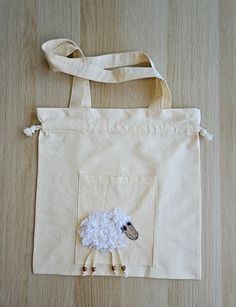 Hand made cotton tote bag by swing. It is 100% cotton. high quality, thick cotton.  You can use it for shopping at the farmers market, grocery store, going to beach, lake, painting class or collage. This bag has strap to close the top part. Cute Beige Cotton Shoulder Bag, Handmade Beige Cotton Canvas Bag, Handmade Cotton Canvas Tote Bag, Handmade Cream Canvas Tote Bag, Handmade Cute Cotton Shoulder Bag, Cute Handmade Cotton Shoulder Bag, Cute Cotton Tote Shoulder Bag, Cream Cotton Bags For Gifts, Handmade Cream Cotton Shoulder Bag