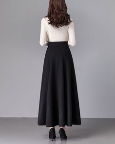 * A high-end long wool skirt with wide hem, very cool. * Made of wool blends, fully lined and with two side pockets. * Fixed waist and side invisible zipper. * Can custom make waist size and skirt length. * Material: Outer-50% wool, 50% polyester; lining-100% polyester * Washing instructions: Dry Clean Only * Size: True to US size, US 0-US 20 are available, you can let us know your usual size and height in your order. * Shipping: Free shipping Processing time : 5-7 Business days Delivery time : Black A-line Maxi Skirt For Winter, Elegant Winter Maxi Skirt, Winter Evening Midi Skirt, Long Skirt For Evening Winter Wear, Formal Full-length Fall Skirt, Chic A-line Maxi Skirt For Winter, Black Maxi Skirt For Winter Evening, Winter Black Wide Leg Skirt, Elegant Wide Leg Maxi Skirt For Fall