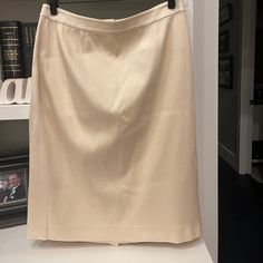 Cream Pencil Skirt Classic Fitted Midi Skirt, Elegant Full Mini Skirt For Spring, Spring Workwear Silk Skirt, Spring Pencil Skirt Suit, Elegant Fitted Lined Skirt, Fitted Long Silk Skirt, Formal Fitted Lined Skirt, Classic Fitted Skirted Bottoms, Fitted Silk Skirt