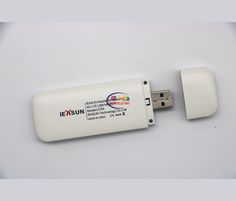 a white usb stick attached to an external charger